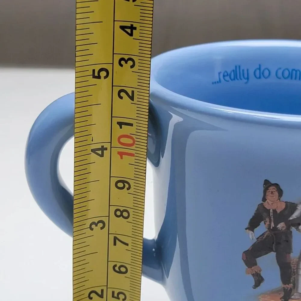 Wizard of Oz Pedestal Coffee Mug Blue Wishes Really Do Come True Dorothy Cup